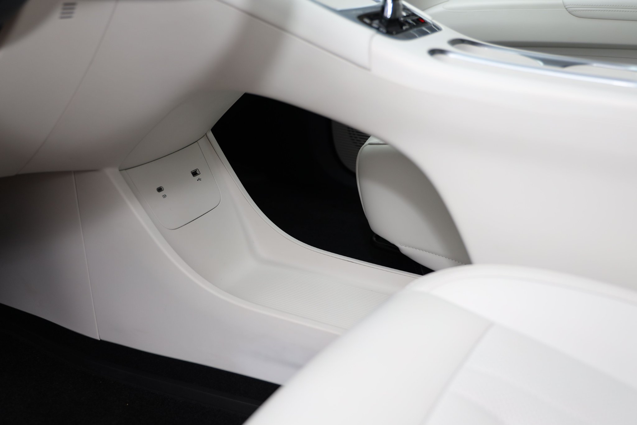 There is a storage compartment under the center island and two charging ports.